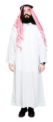 Wall Mural - Arabian business man with long hair wearing traditional keffiyeh scarf Relaxed with serious expression on face. Simple and natural looking at the camera.