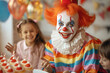 Adult clown animator on kids birthday party.