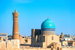 Old Town of Bukhara with traditional blue Dome, Madrasa and Kalyan Minaret in Uzbekistan