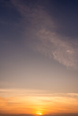 Wall Mural - sunset sky vertical, evening sky clouds with orange sunlight
