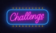 Challenge Neon Sign on brick wall background.