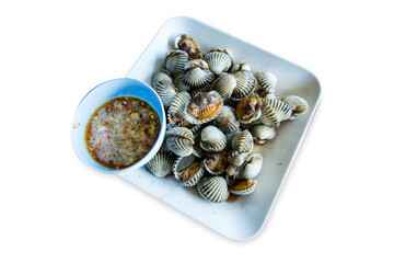 Wall Mural - Top view of Steamed cockle ( Boiled cockles ) with spicy seafood sauce, focus selective