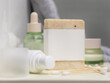 Soap bar with blank label near cosmetic products in bathroom close up, mockup