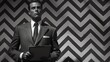 A 1950s private investigator stands in a room with a chevron pattern on the walls