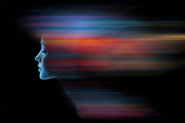 Wall Mural - Abstract portrait of a woman with a glowing face on a black background