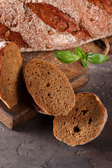 Poster - homemade rye bread loaf on a wooden table