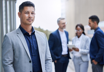 Canvas Print - Balcony, leadership and portrait of business man outdoor at office in city with corporate team. Company, confidence or management and professional employee at workplace in urban town for opportunity