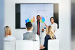 © peopleimages.com - Business people, coach and chart with screen for presentation, meeting or corporate statistics at seminar. Businessman and speaker talking to group of employees on company revenue, growth or profit