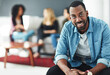 © peopleimages.com - Meeting, business people and portrait of black man in work lounge for new job, opportunity or career goals. Startup, training and happy African management intern in coworking space with confidence
