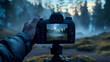 Photographer takes photos of forest in the evening with DSLR camera on tripod. for illustration, background, backdrop, photography book, travel, advertising, film.