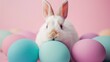 Easter rabbit hiding eyes inside colorful pastel egg