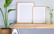 Blank picture frames template on a wall