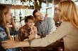 © Davor - Family enjoying time together at a cafe