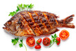 Grilled fish with roasted tomatoes isolated on white background