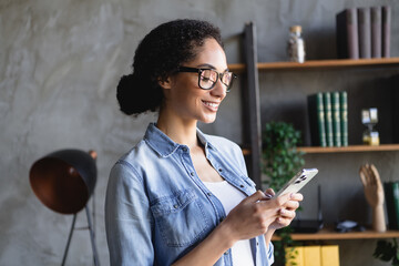 Poster - Photo of attractive corporate agent girl use smart phone loft interior business center office indoors