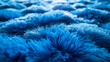 A close up of blue furry material.