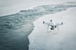 Drone flying over icy waters and snow