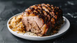 Estonian roast pork with savory herbs and sauerkraut, presented on a white plate against a contrasting dark backdrop