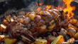 Traditional mongolian barbecue with succulent meat and potatoes roasting on open flame, epitomizing rustic outdoor cooking and cultural cuisine