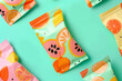 ziplock fruit pouches with a modern print on a pastel mint background