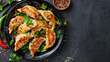Delicious mongolian cuisine: mouthwatering fried dumplings with fresh herbs, served on a traditional cast iron skillet