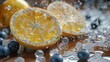   A close-up of a lemon and blueberries on a wooden table with water droplets