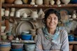 successful woman owner of pottery workshop portrait photography