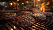 © Dan Wroblewski - Several Juicy Hamburger Patties Grilling on a Iron Grate Over an Open Flame