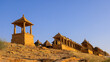 Ancient royal cenotaphs against blue sky in Jaisalmer, Rajasthan, India.