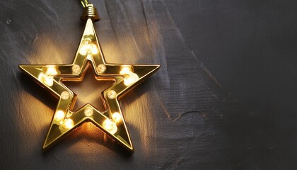 Wall Mural - gold star light hanging on dark background