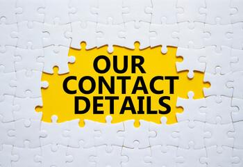 Sticker - Our Contact Details symbol. Concept words Our Contact Details on white puzzle. Beautiful yellow background. Business and Our Contact Details concept. Copy space.