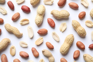 Wall Mural - Fresh peanuts on white background, flat lay