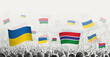 People waving flag of Gambia and Ukraine, symbolizing Gambia solidarity for Ukraine.