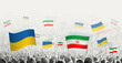 People waving flag of Iran and Ukraine, symbolizing Iran solidarity for Ukraine.