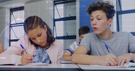 Wall Mural - In school, Caucasian girl/friend writing, biracial boy/friend looking aside