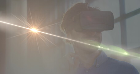 Poster - Image of light spots over caucasian man with vr headset