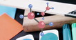 Colorful markers and molecular model sitting on a school desk