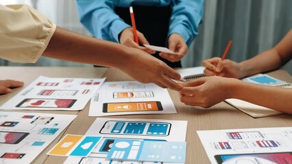 Panorama video of startup company employee planning on user interface prototype for mobile application or website in office. UX UI designer brainstorm designing user friendly interface plan. Synergic