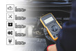 Car mechanic use voltmeter to check voltage battery low energy problem with car care service icons for maintenance and re charger or jump start or change battery replacement.