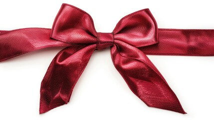 Wall Mural - Red ribbon with a shiny finish and bow set against a white background