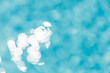 Blur bokeh view of sea surface. Top view of transparent turquoise ocean water surface. Clean recreational summer environment, amazing ecology. Sea ocean water, bright blue. Peaceful artistic pool
