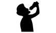 silhouette of man is drinking water from a bottle