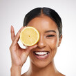 Lemon, beauty and portrait of woman in studio with natural organic and healthy facial treatment. Skincare, wellness and person with citrus fruit for vitamin c for dermatology by gray background.