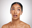 © peopleimages.com - Face, skincare and beauty of woman thinking of makeup for glow, shine or wellness isolated on white studio background. Dream, dermatology and young model in cosmetics for health, aesthetic or serious