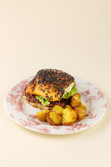 Wall Mural - burger on a plate with potatoes