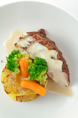 Poster - fried duck breast with sauce and side dish on a plate