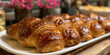A plate of croissants on a table.