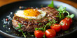 Steak with egg and tomatoes on a black plate.