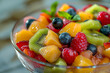 Fresh Colorful Fruit Salad in Glass Bowl