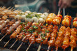Delicious Street Food Grilling. Sizzling skewers with variety of grilled foods on a barbecue